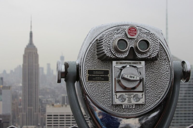 binoculars with empire state building view