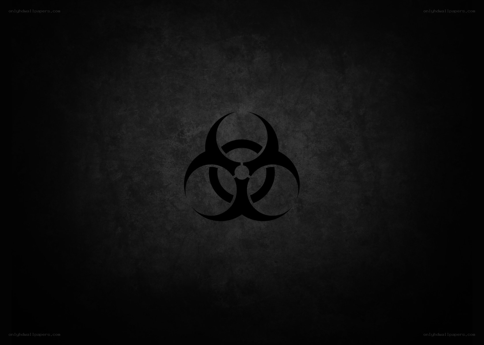 Biohazard symbol on dark background