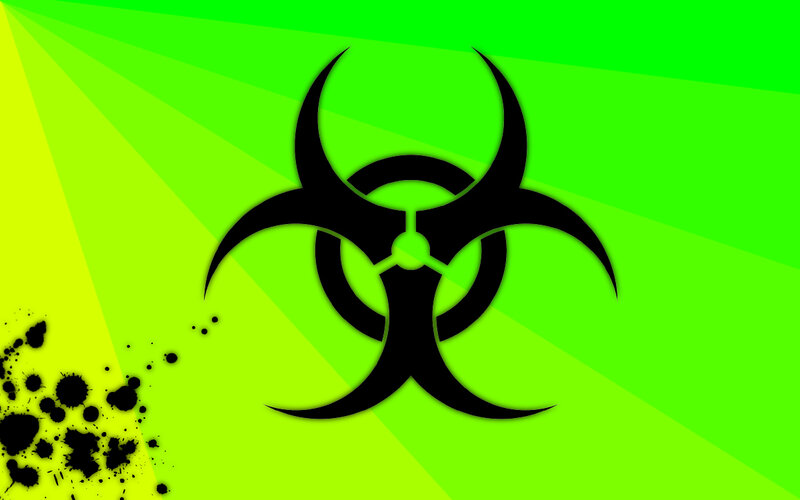 Biohazard symbol on green background