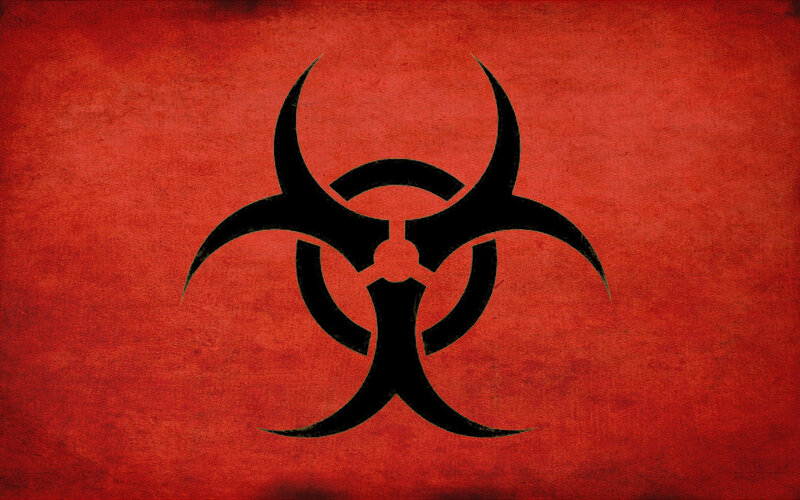 Biohazard symbol on red background