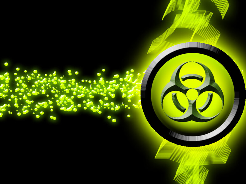 Biohazard symbol with green particles