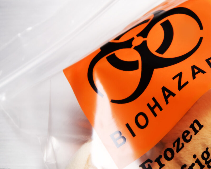 Biohazard warning label on plastic bag