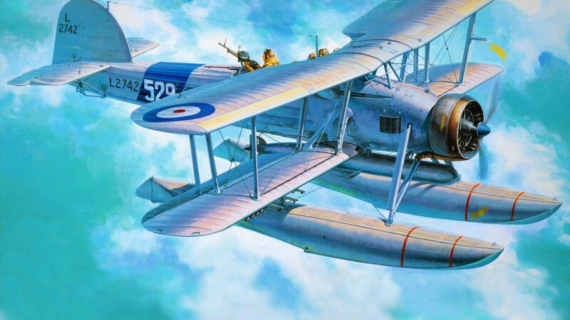 Biplane Flying over Clouds