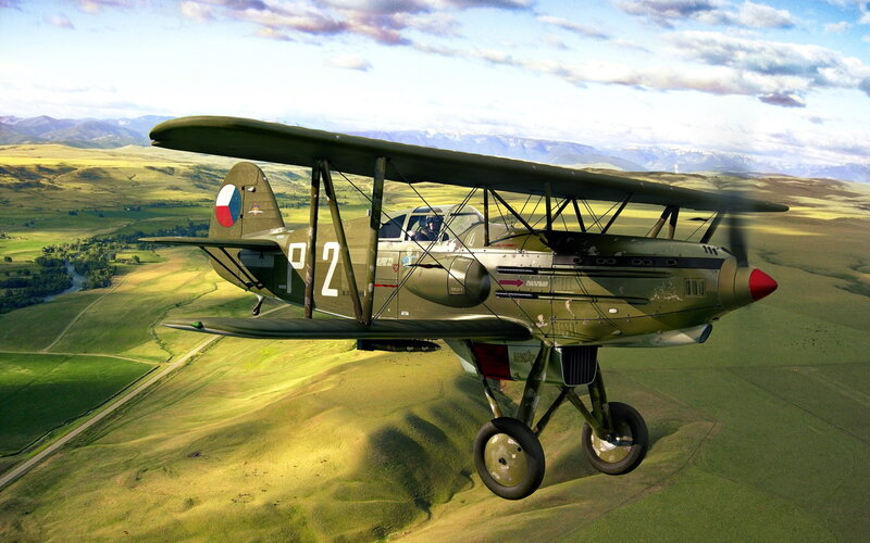 Biplane Flying over Hills