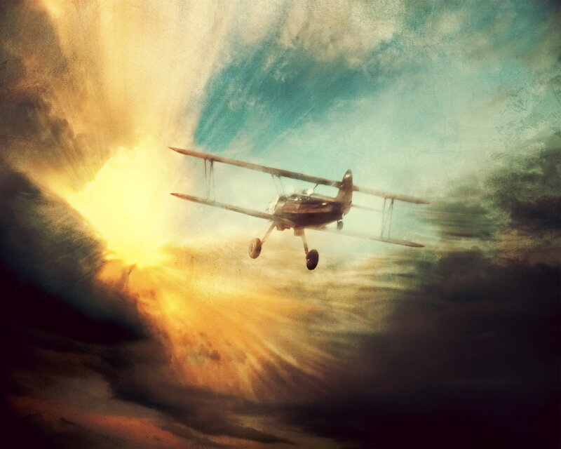 Biplane flying through stormy sky