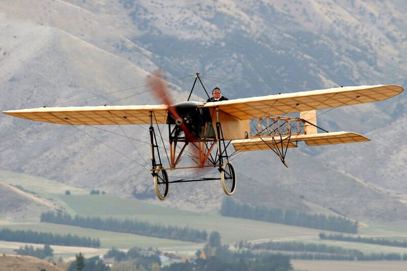 Biplane in Flight — Beige