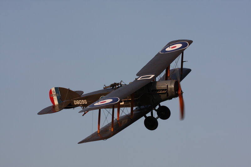 Biplane in Flight — Blue, Calm, Afternoon