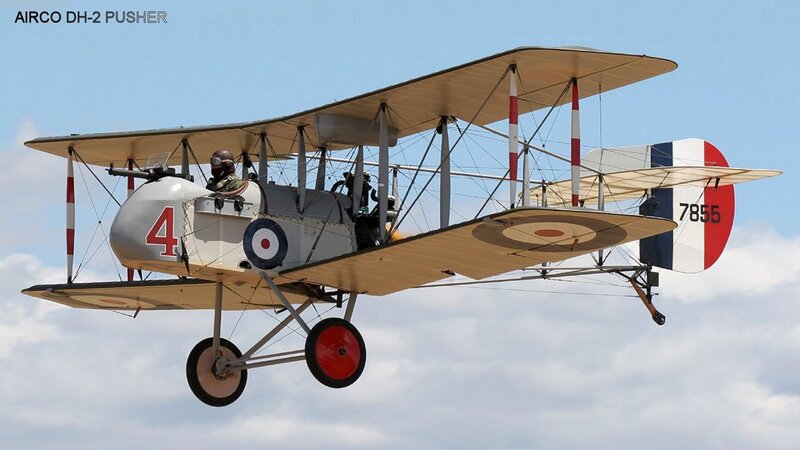 Biplane in Flight — Blue, Clear, Afternoon, Photograph