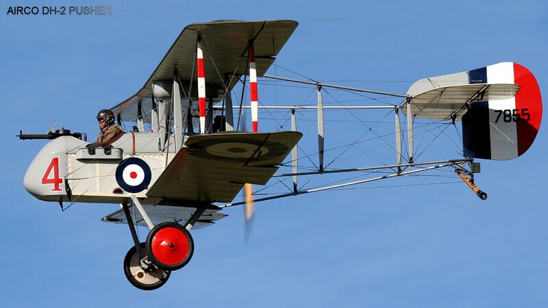 Biplane in Flight — Blue, Clear, Afternoon