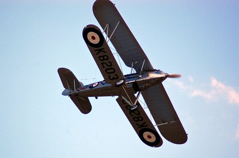 Biplane in Flight — Blue, Dynamic, Afternoon, Photograph