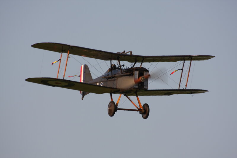 Biplane in Flight — Gray, Calm