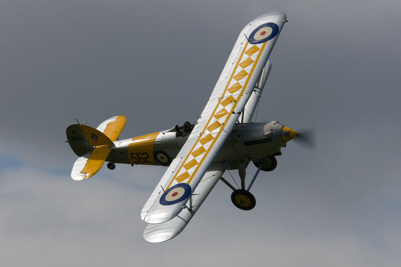Biplane in Flight — Gray, Dynamic, Afternoon, Photograph
