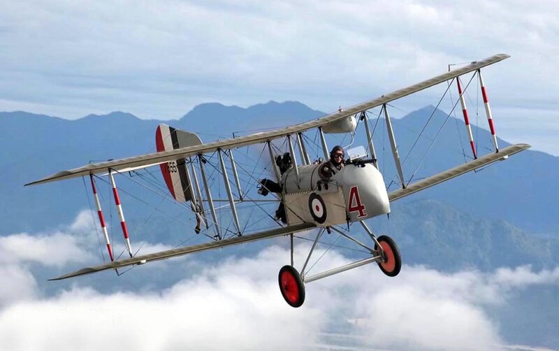 Biplane in Flight — Gray, Serene