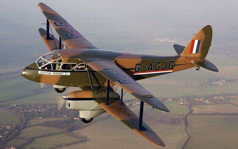 Biplane in Flight — Green