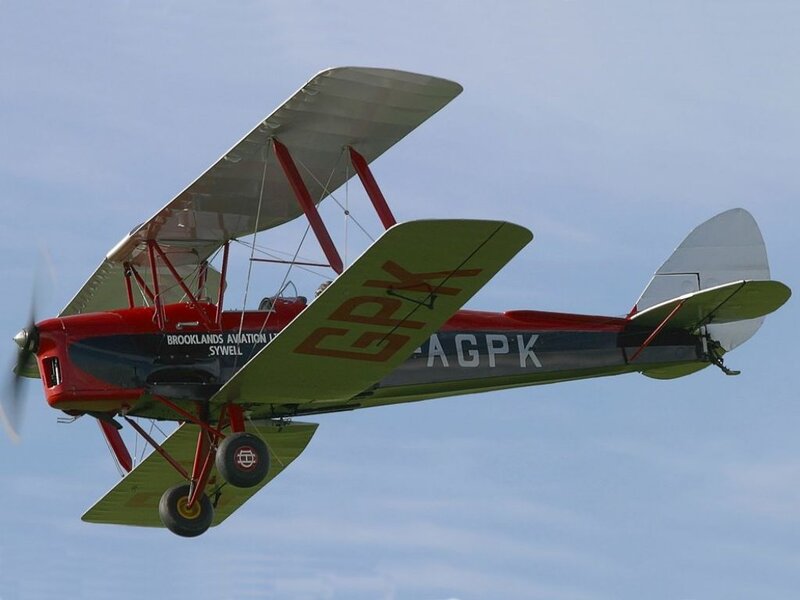 Biplane in Flight — Red
