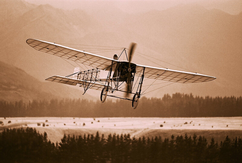 Biplane in Flight — Sepia