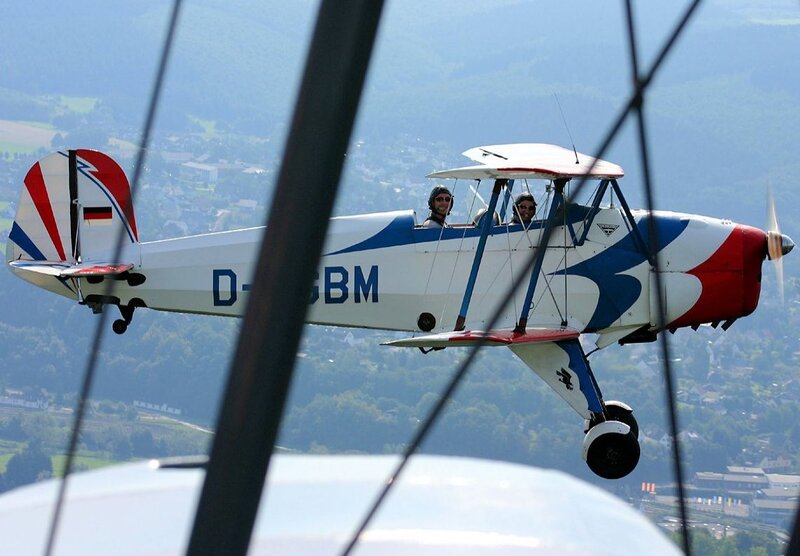 Biplane in Flight — White, Active