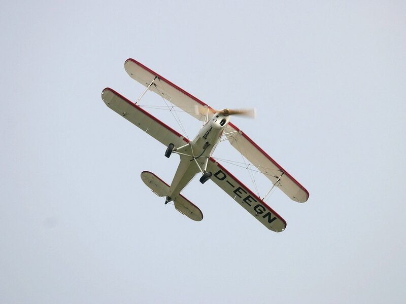 Biplane in Flight — White, Calm, Photograph