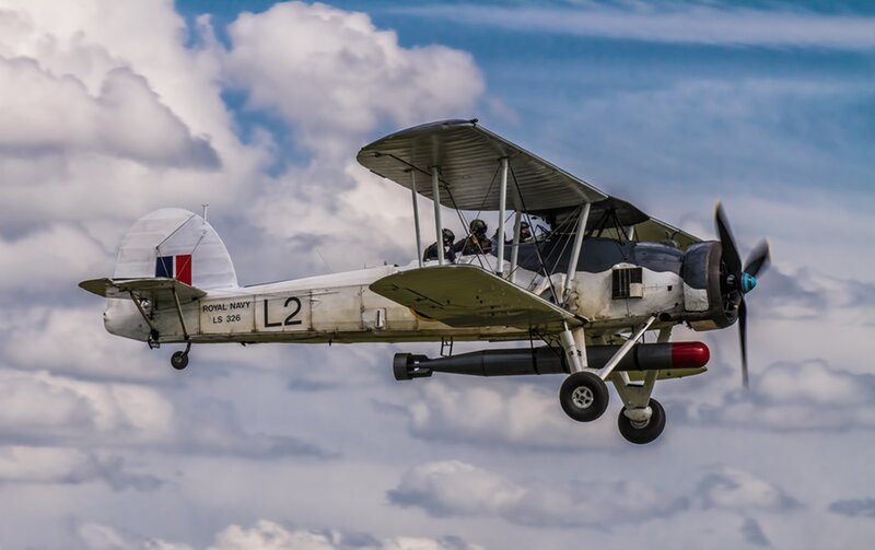 Biplane in Flight — White, Dramatic