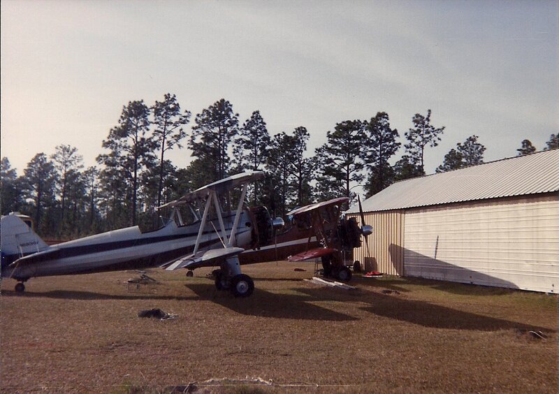 Biplane on Airfield — Brown