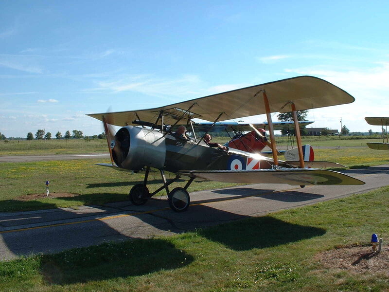 Biplane on airfield tarmac