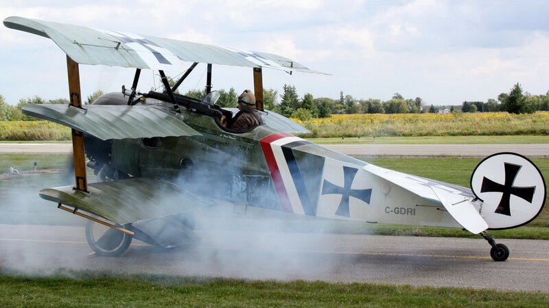 Biplane on Runway — Green