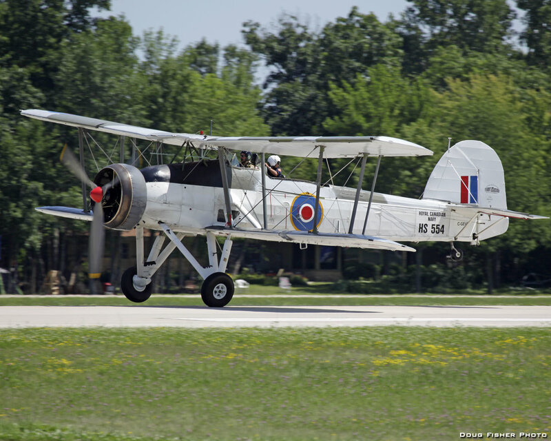 Biplane on Runway — White