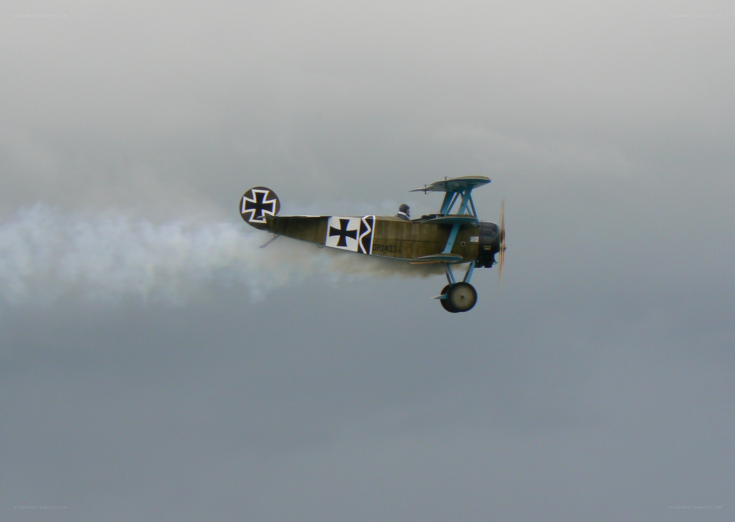 biplane performing aerobatic maneuver