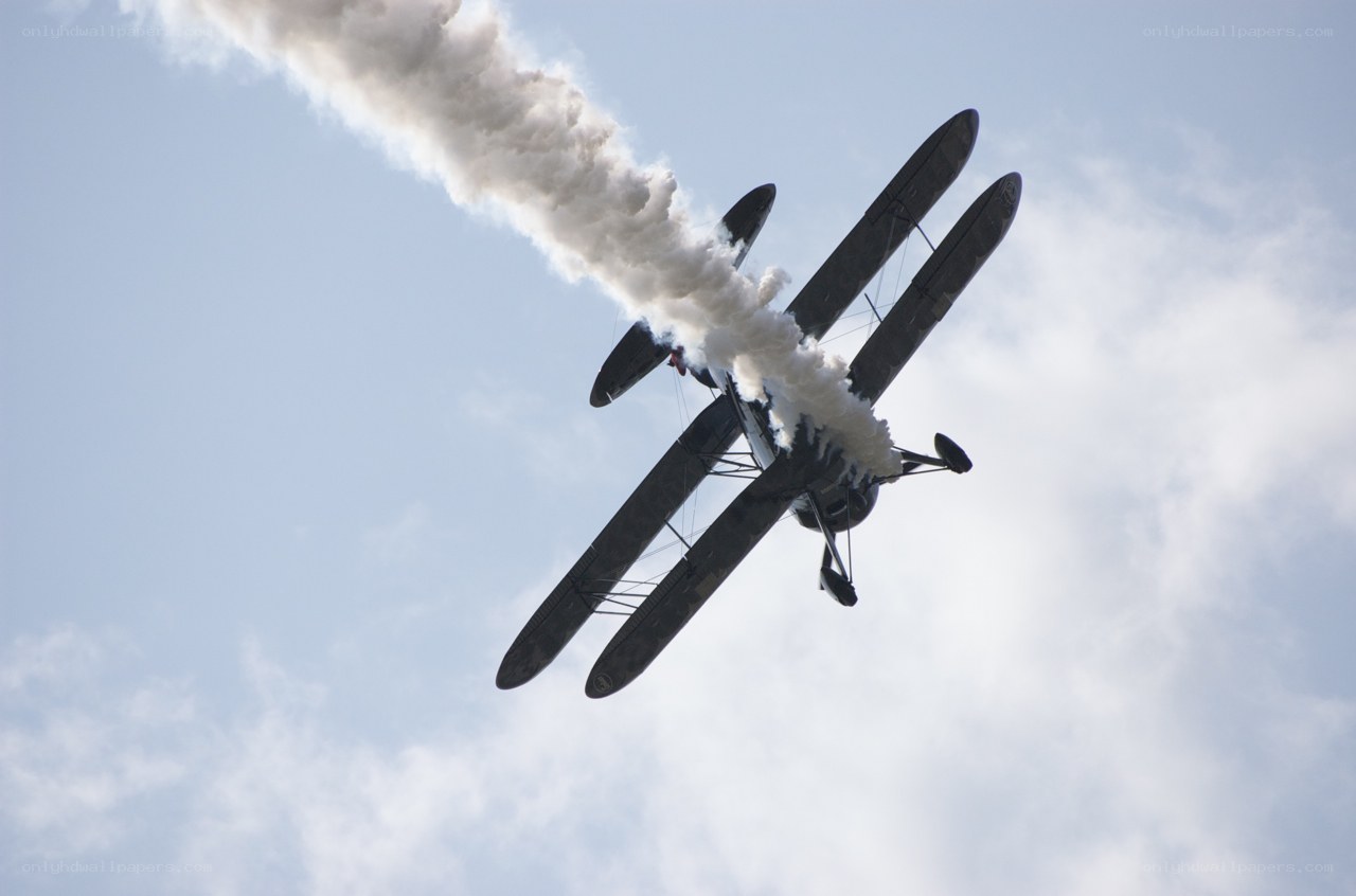Biplane performing aerobatic stunt