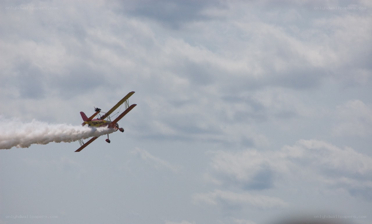 biplane performing aerobatic stunt