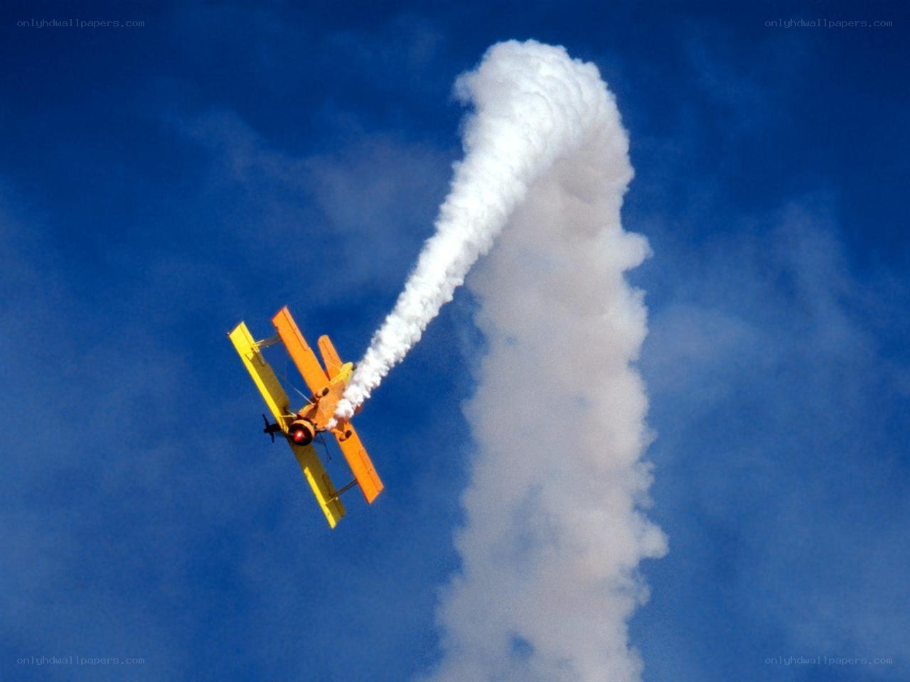Biplane performing aerobatic stunt