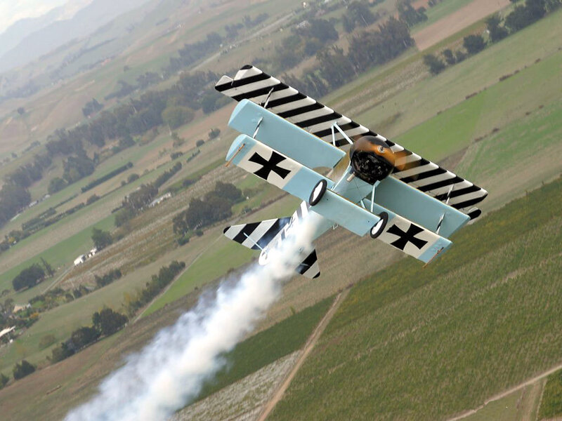 biplane performing aerobatic stunt