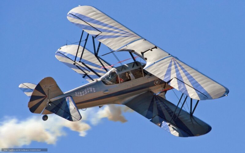 biplane performing aerobatics