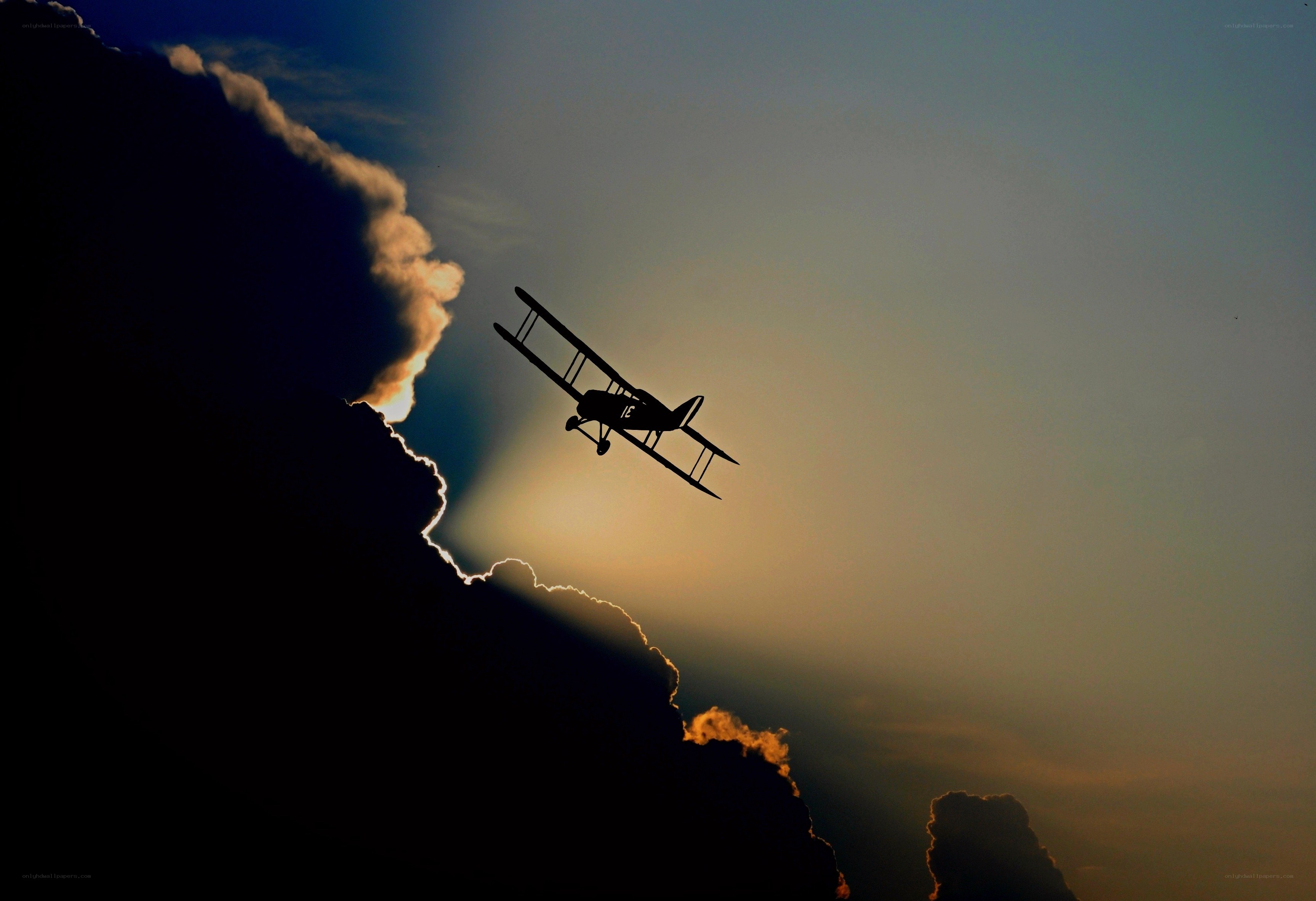 Biplane Silhouette at Sunset