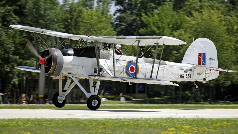 Biplane Taking Off — White