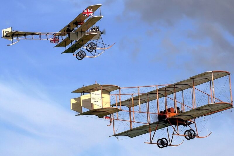 Biplanes in Flight — Blue