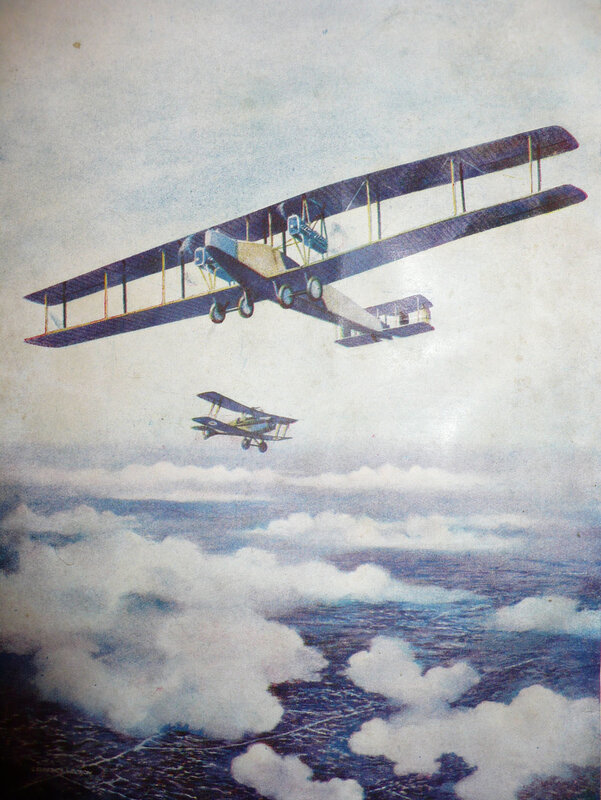 Biplanes in flight over clouds