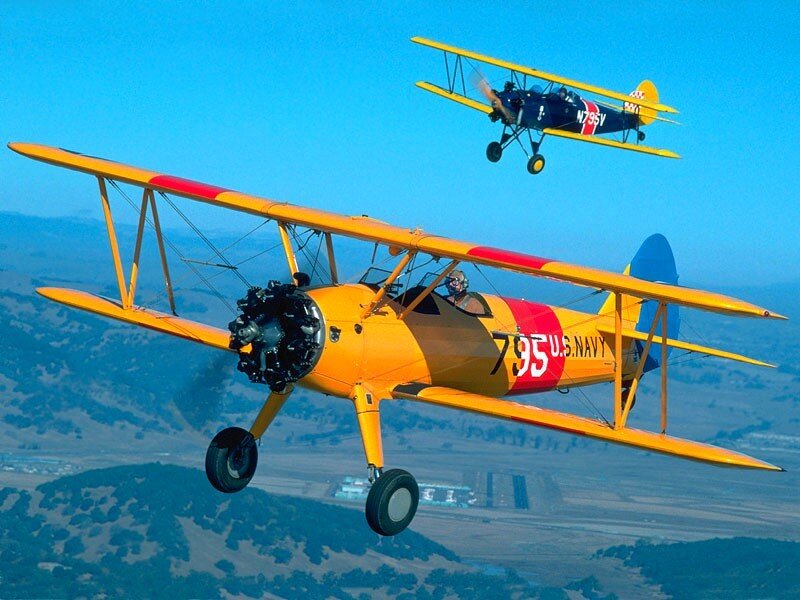 Biplanes in flight