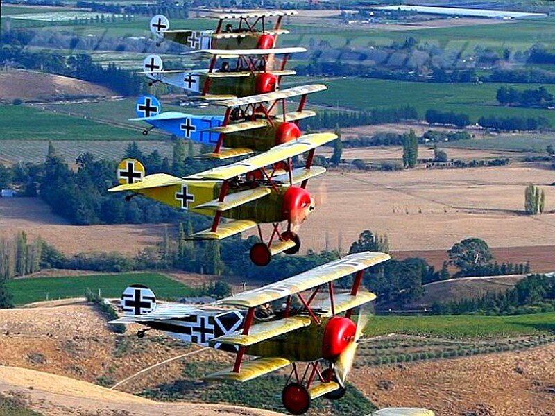 biplanes in formation flight