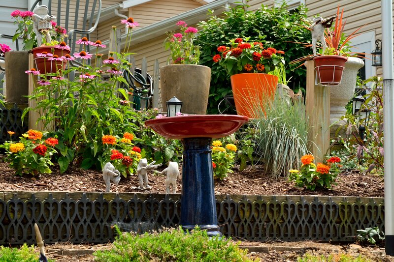 Bird Bath in Garden — Red