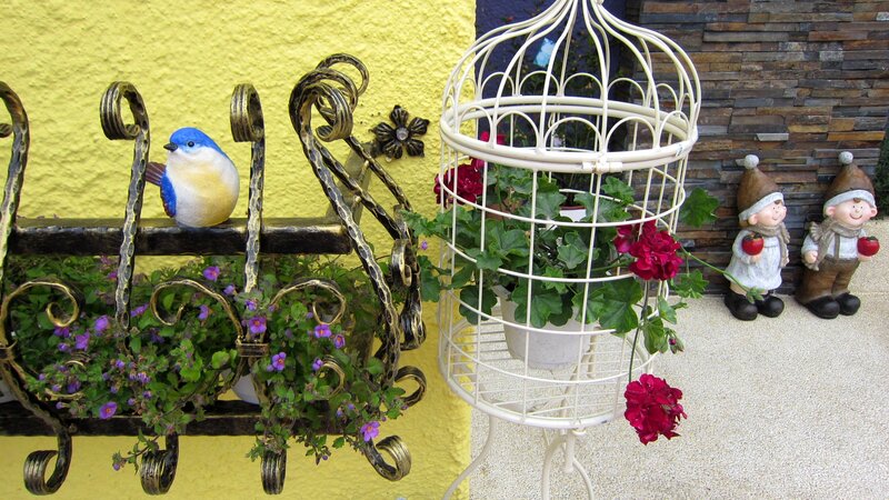 Bird Figurine in Garden