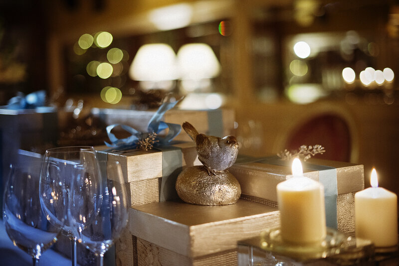 Bird Figurine on Gift Boxes