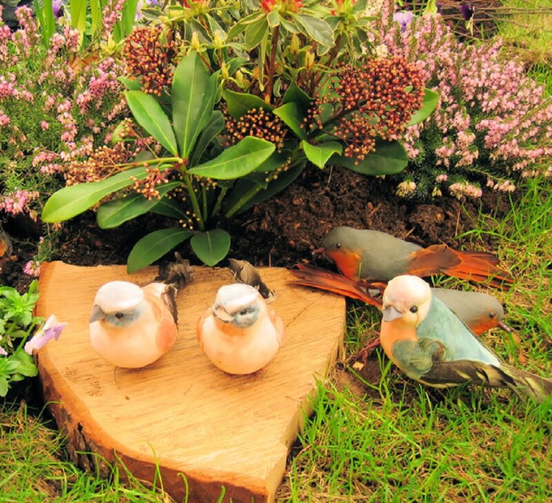 Bird Figurines in Garden