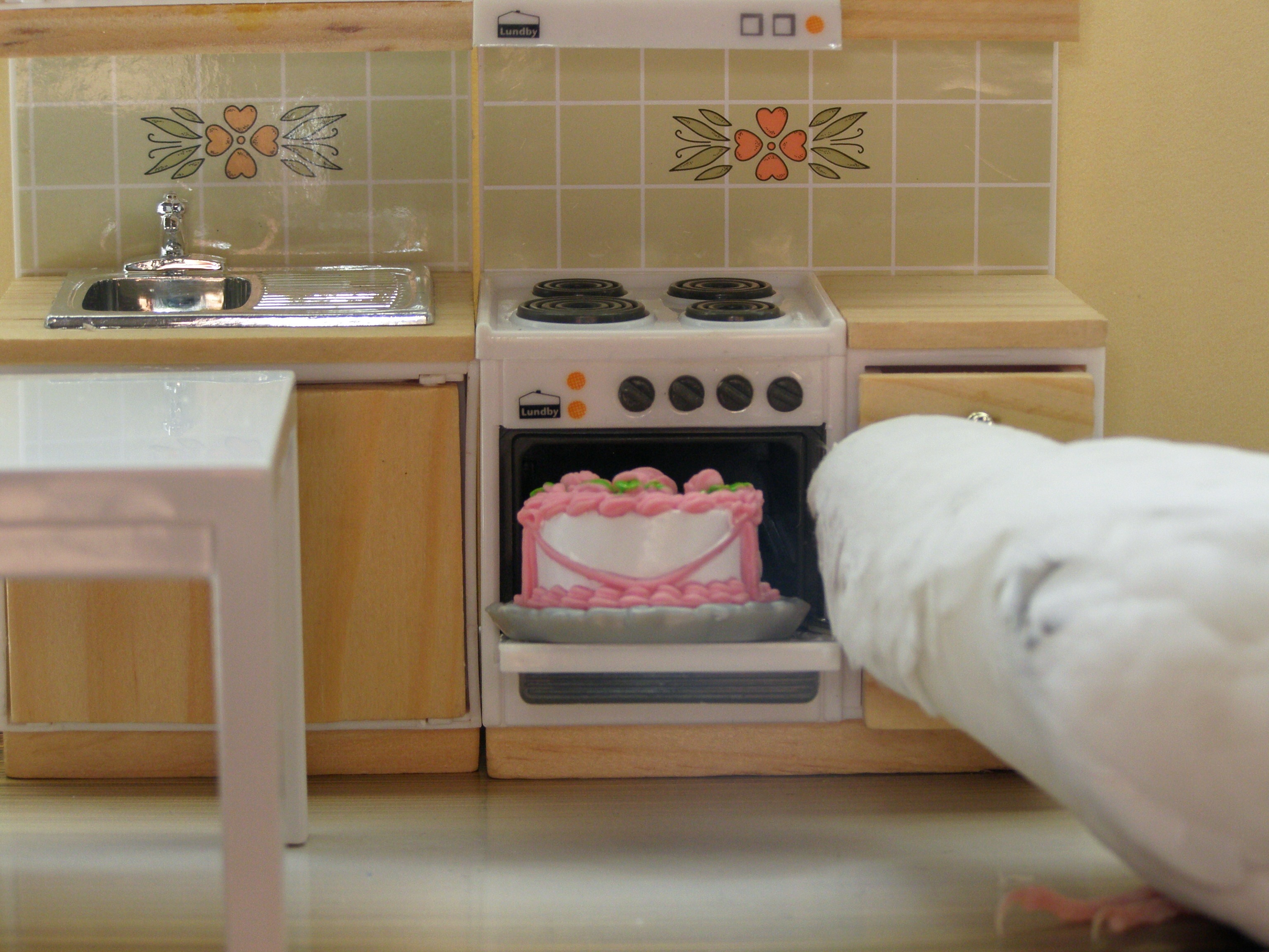 bird in dollhouse kitchen