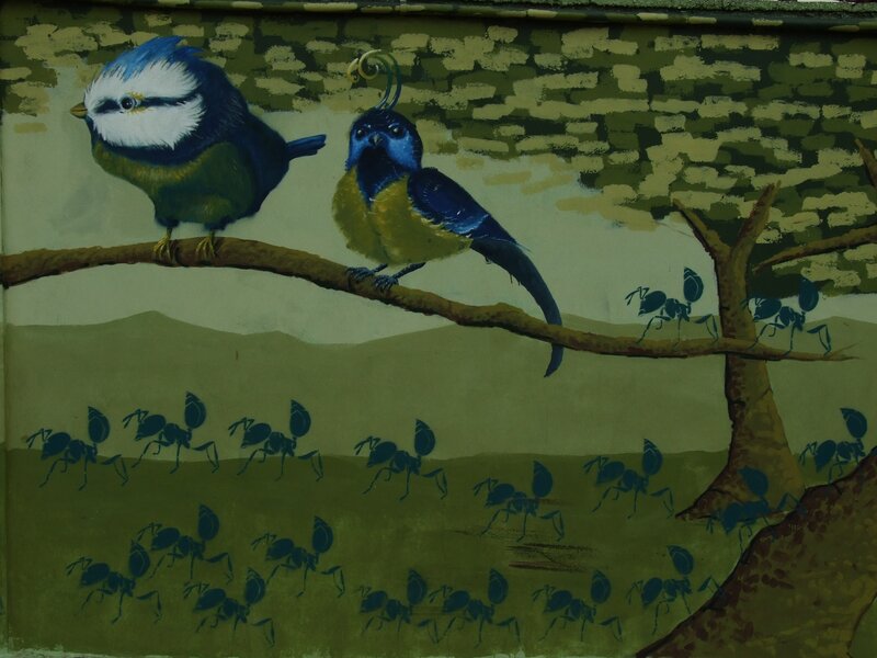 birds and ants on a branch