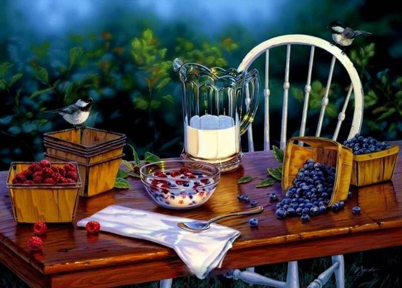 Birds and berries on a table