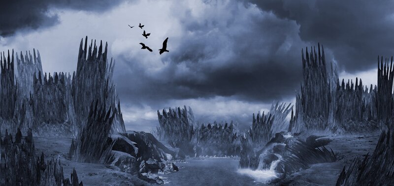 Birds Flying over Jagged Rocks