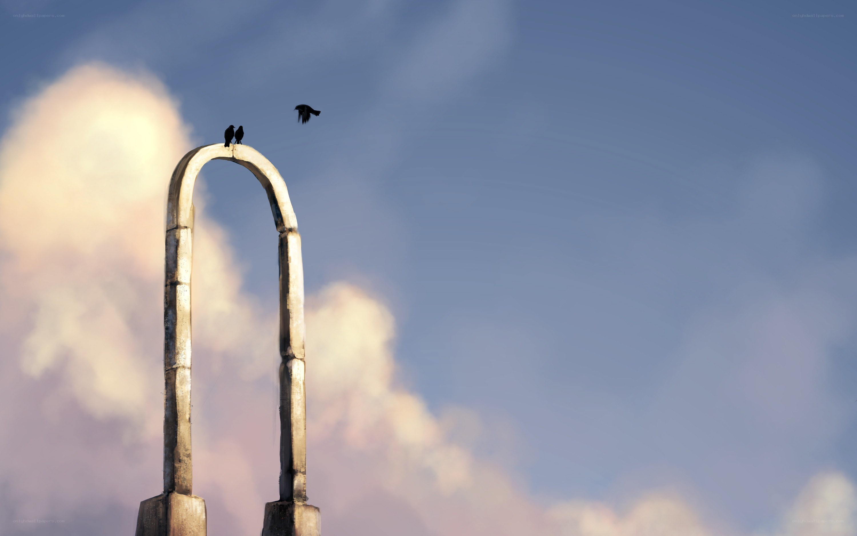 Birds on an arch at sunset