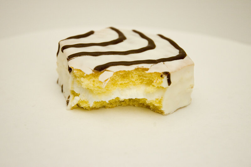 bitten cake slice with icing