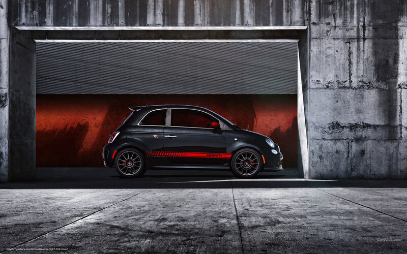 Black Abarth car in garage